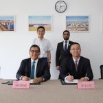 Samir Chaturvedi and Meng Changjun at the deal signing ceremony