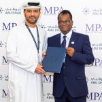 Captain Mohamed Juma Al Shamisi and Ramalingum Maistry at the signing ceremony at Abu Dhabi Ports' HQ in Abu Dhabi