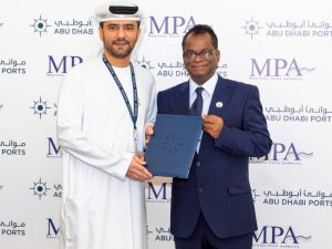 Captain Mohamed Juma Al Shamisi and Ramalingum Maistry at the signing ceremony at Abu Dhabi Ports' HQ in Abu Dhabi