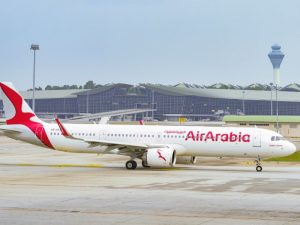 An Air Arabia jet lands at Kuala Lumpur International Airport