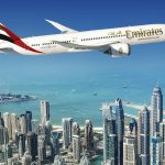 An Emirates Boeing 787 Dreamliner takes flight over the skies of Dubai