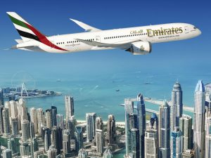 An Emirates Boeing 787 Dreamliner takes flight over the skies of Dubai