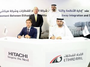 Etihad Rail and Hitachi Rail STS officials at the deal signing ceremony