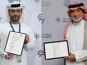 Capt. Mohamed Juma Al Shamisi (L) and Rakan Alireza at the deal signing ceremony