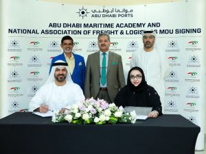 Capt. Maktoum Al Houqani and Nadia Abdul Aziz ink the MoU in the presence of ADMA and NAFL officials