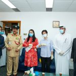 Dubai Police and Al Fonoon Group officials pose for a joint picture