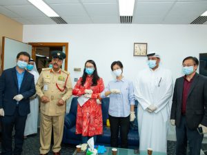 Dubai Police and Al Fonoon Group officials pose for a joint picture