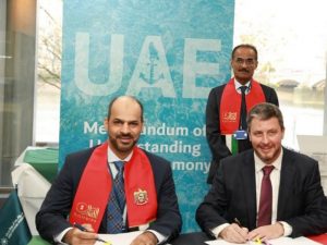 Capt. Maktoum Al Houqani and Mike Fitzpatrick  sign the landmark agreement, in the presence of HE Dr. Abdullah Belhaif Al Nuaimi