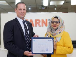 Markus Oberlin and Nadia Ibrahim with the DC Advanced CSR Certificate