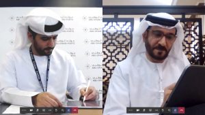 Officials from FTA and Abu Dhabi Ports sign an MoU