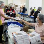 Mask kits being prepared for distribution