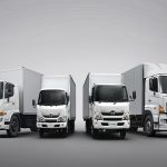 A line-up of HINO commercial vehicles