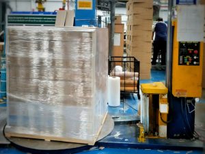 A palette plastic wrapping machine in a factory