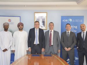 ADIB and Oman Shipping Company officials at the deal signing ceremony