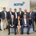 Navin Narayan, CEO, 4th right back, with ACME team