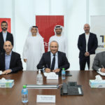 L to R-Bashar Obeid, Amer Kakish and Alaa Hawari ink the deal