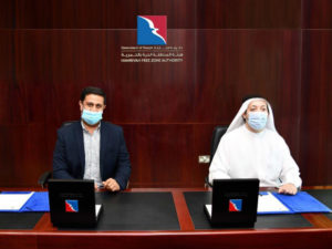Saud Salim Al Mazrouie (R) and Anish Vijapura at the deal signing ceremony
