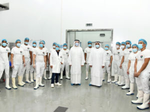 Italian Dairy Products employees pose for a picture with HFZA officials