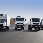 An array of MAN commercial trucks