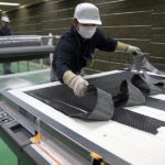 Nissan achieves breakthrough in carbon fiber parts production