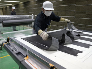 Nissan achieves breakthrough in carbon fiber parts production