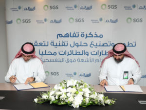 SGS and Al Salem Johnson Controls officials ink the deal