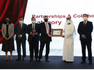 Tristar Shipping CEO Chris Peters (3rd right) receives the award certificate from H.E. Eng. Sheikh Salem bin Sultan bin Saqr Al-Qasimi (2nd right), Chairman of Department of Civil Aviation, Ras Al Khaimah