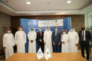 Group picture following the signing of the deal closure ceremony