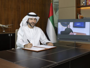 Mohammad Al Bulooki, Etihad Aviation Group COO and Hanan Al Yafei Hub71 CEO sign MoU