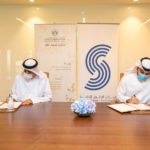 The signing ceremony between Salah Salim Almahmoud (left) and Amin Al Zarouni