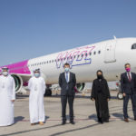 Shareef Al Hashmi, ADAC CEO (L) and Wizz Air Abu Dhabi's MD, Kees Van Schaick (R) mark the launch of Wizz Air Abu Dhabi