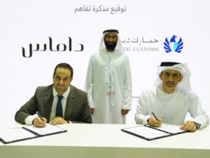 Mohammed Al Ghaffari and Anas Abu Na’ama signing the MoU in the presence of H.E. Abdullah Ali bin Zayed Al Falasi